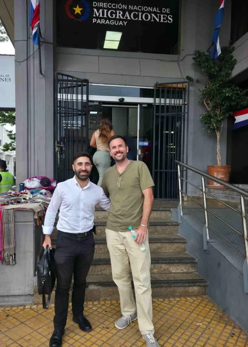 Osher with a canadian client at the immigration offices in Asuncion, Paraguay